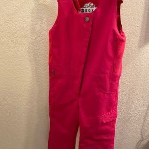 Roxy pink 3T Snow Bibs adjustable on both shoulders.